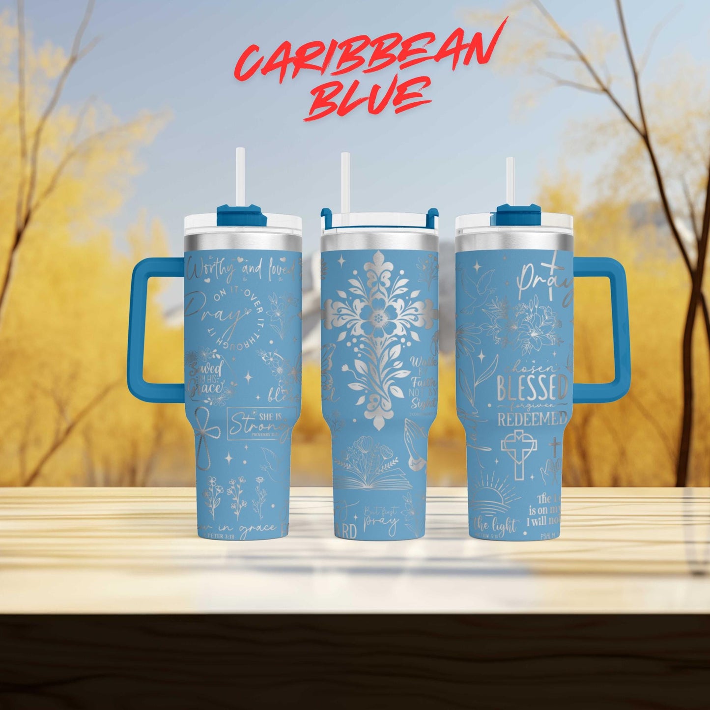 a couple of blue cups sitting on top of a wooden table