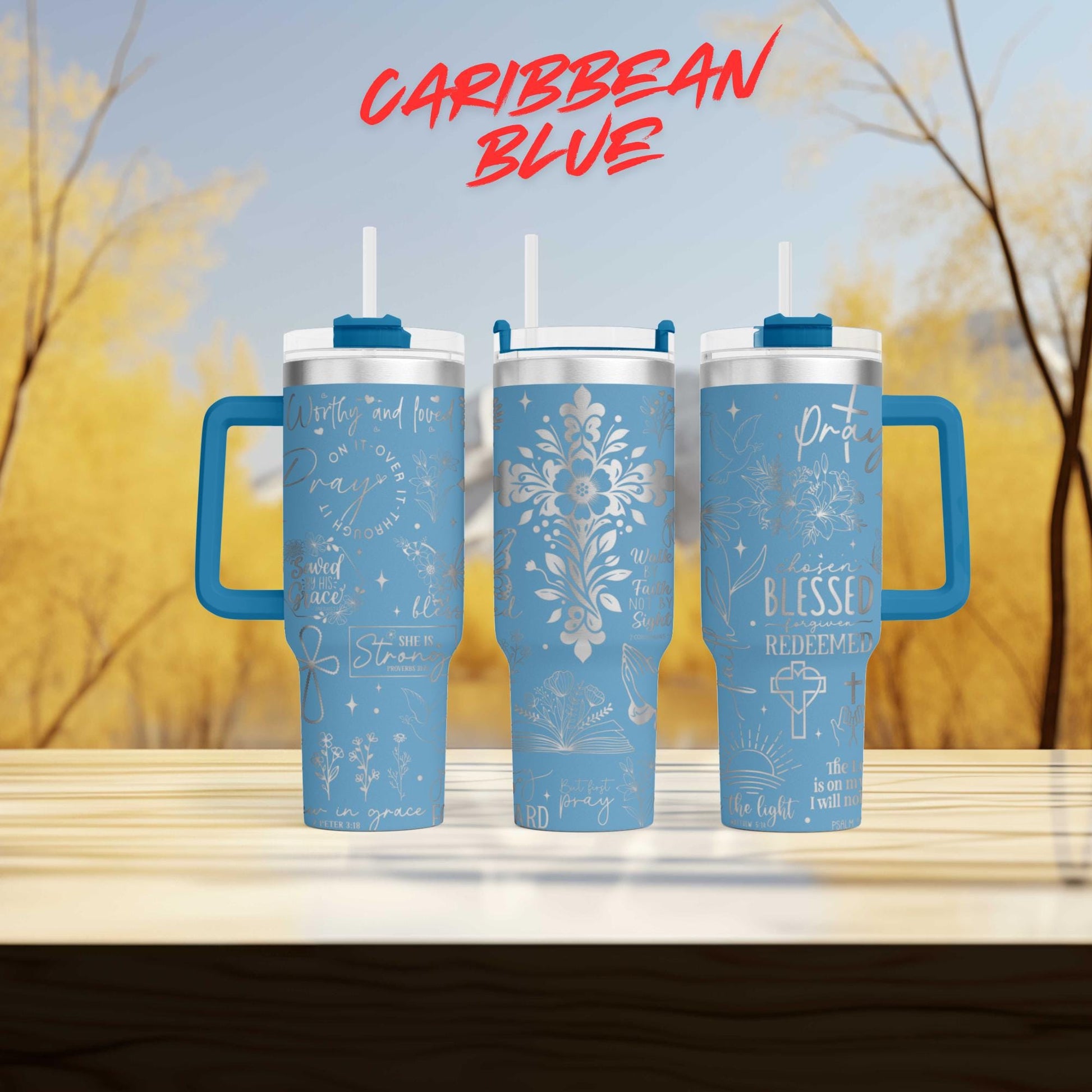 a couple of blue cups sitting on top of a wooden table