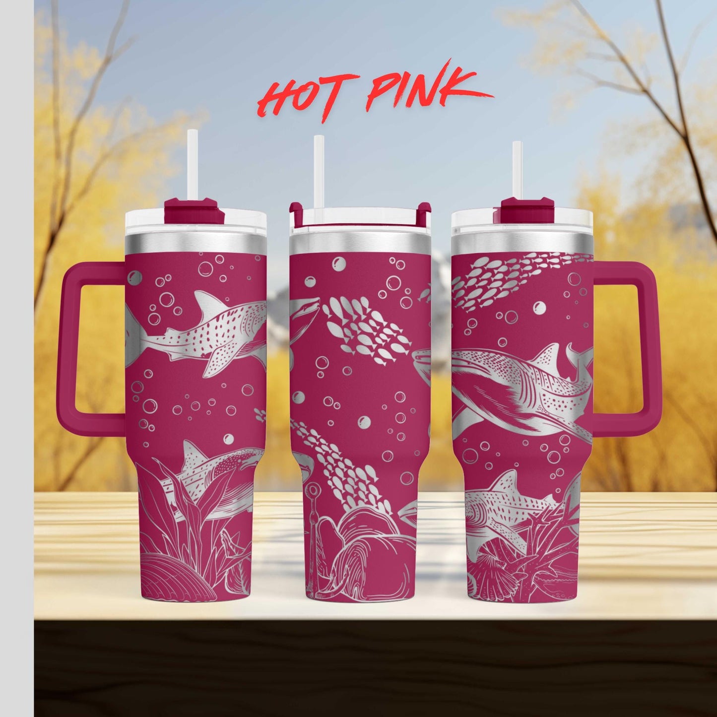 three pink coffee mugs sitting on top of a wooden table