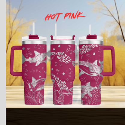 three pink coffee mugs sitting on top of a wooden table