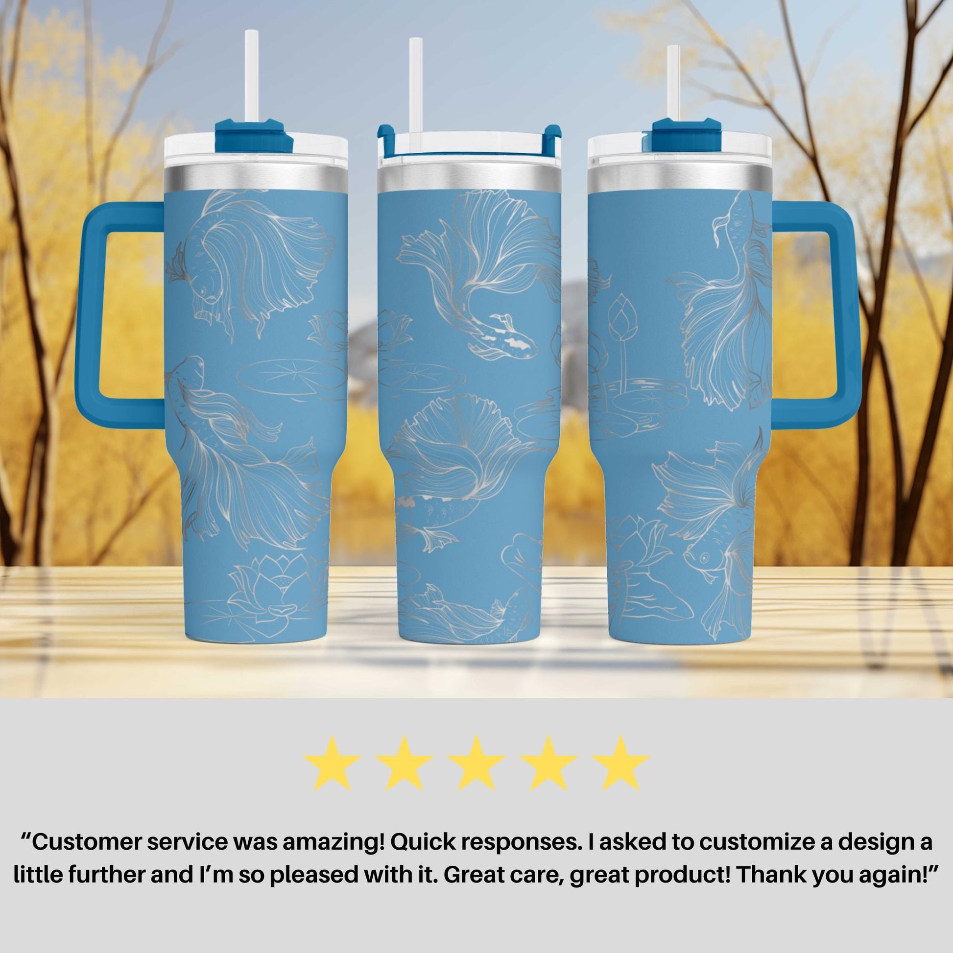 three blue travel mugs sitting on top of a table