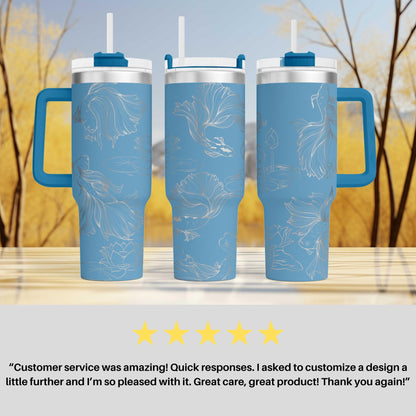 three blue travel mugs sitting on top of a table
