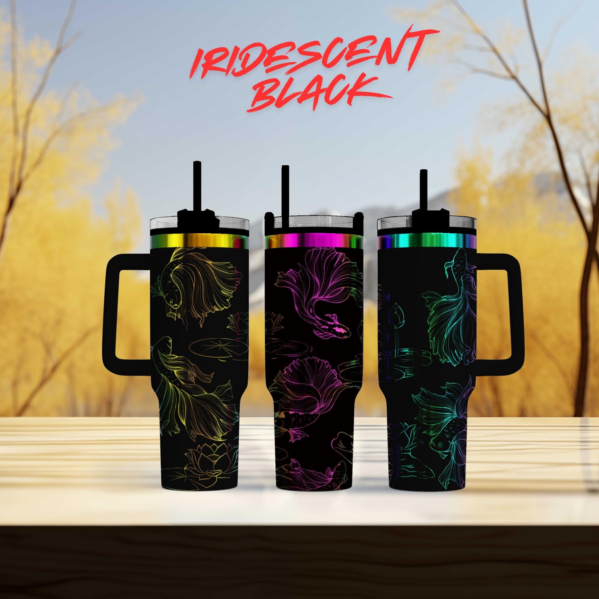 three colorful tumblers sitting on top of a wooden table