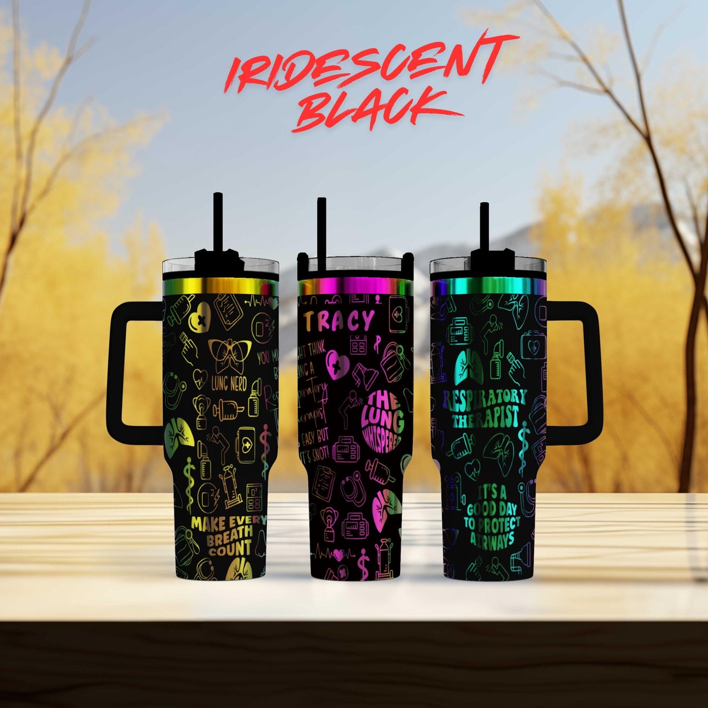 three different colored tumblers sitting on top of a table