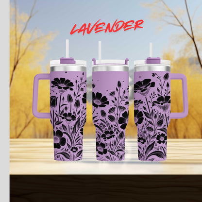 three travel mugs sitting on top of a wooden table