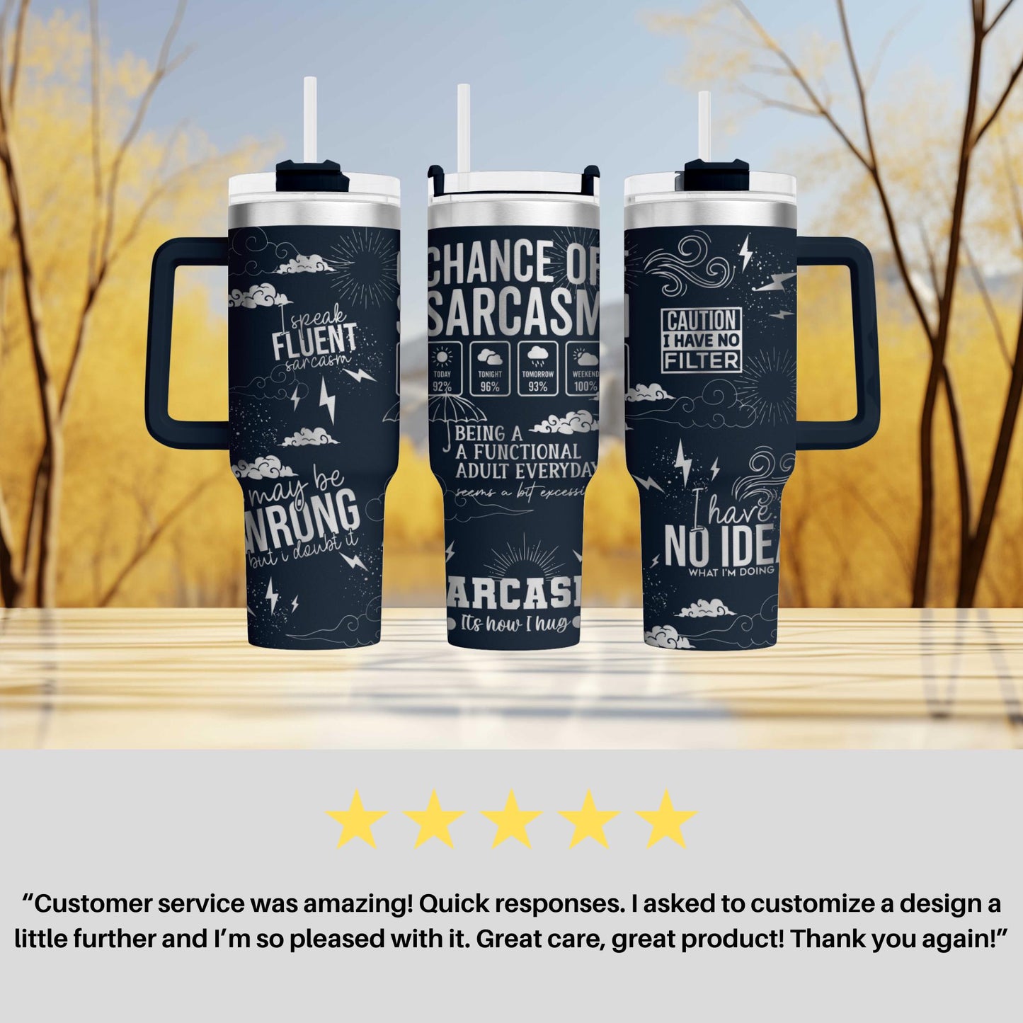 a couple of travel mugs sitting on top of a table