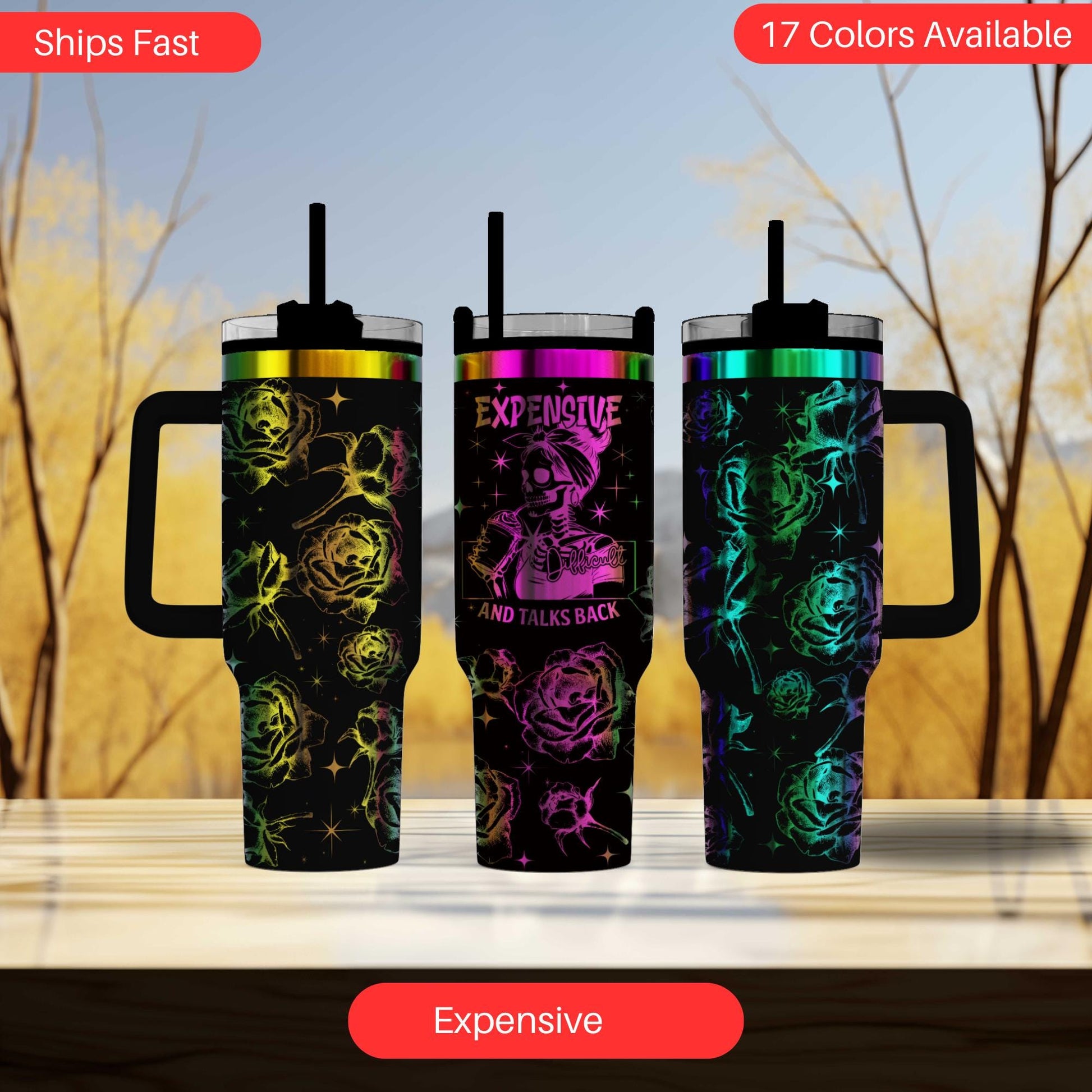 a set of three travel mugs sitting on top of a table