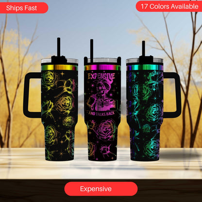 a set of three travel mugs sitting on top of a table