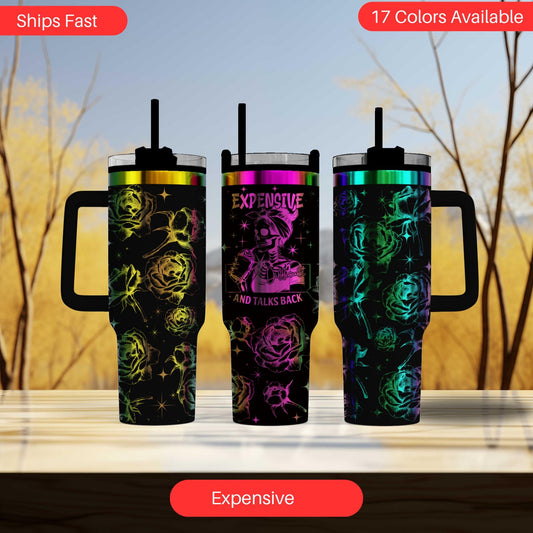 a set of three travel mugs sitting on top of a table