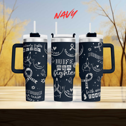 three travel mugs sitting on top of a wooden table