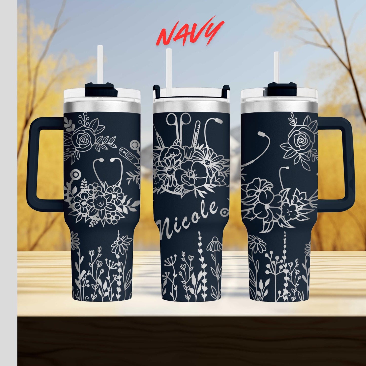 three travel mugs sitting on top of a wooden table