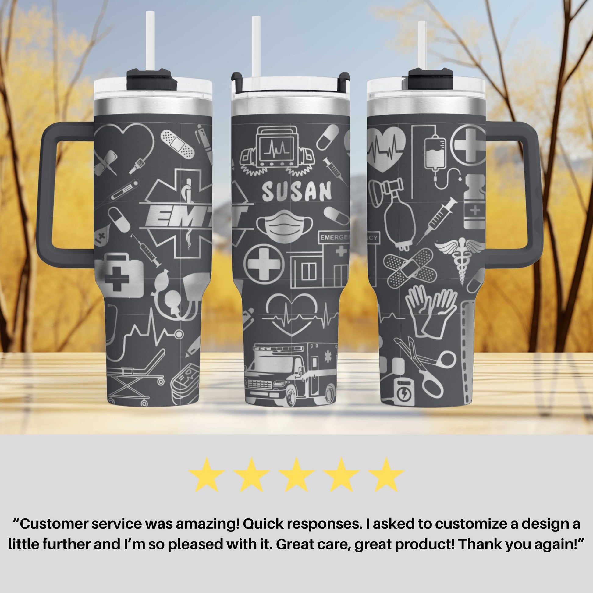 a couple of travel mugs sitting on top of a table