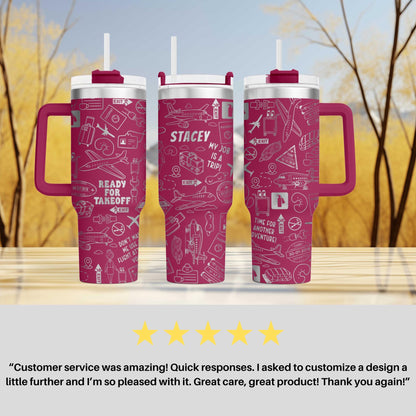 three pink tumblers with various airplane and travel-related designs printed on them. The tumblers have a handle and a straw, and there is a rating and a customer review below the image.