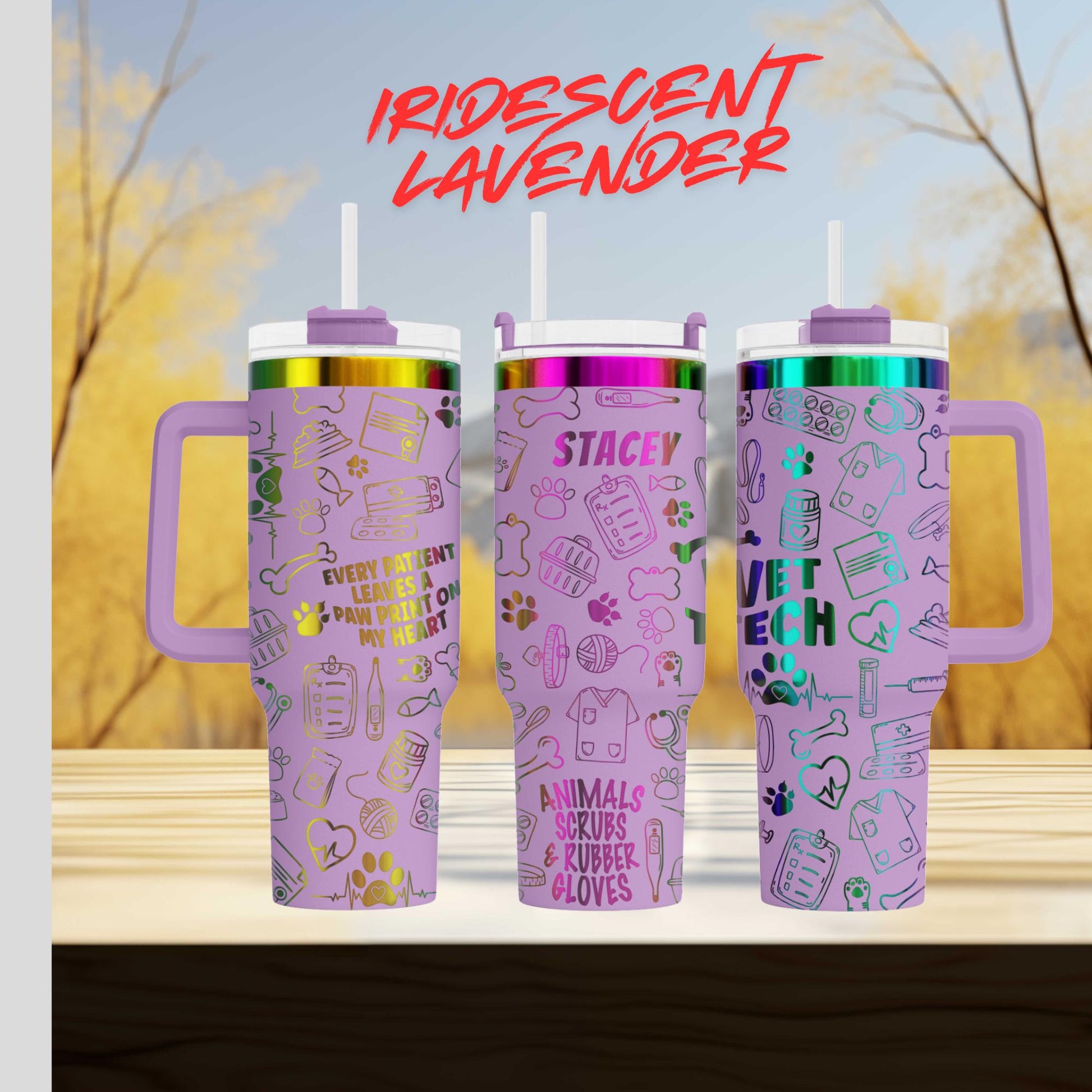 three colorful, patterned tumblers with purple handles, each with a unique design and text.