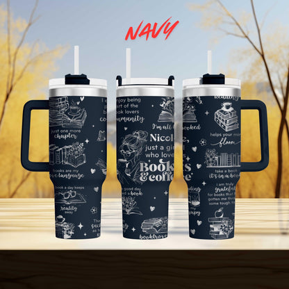three black tumblers with white text and illustrations printed on them.