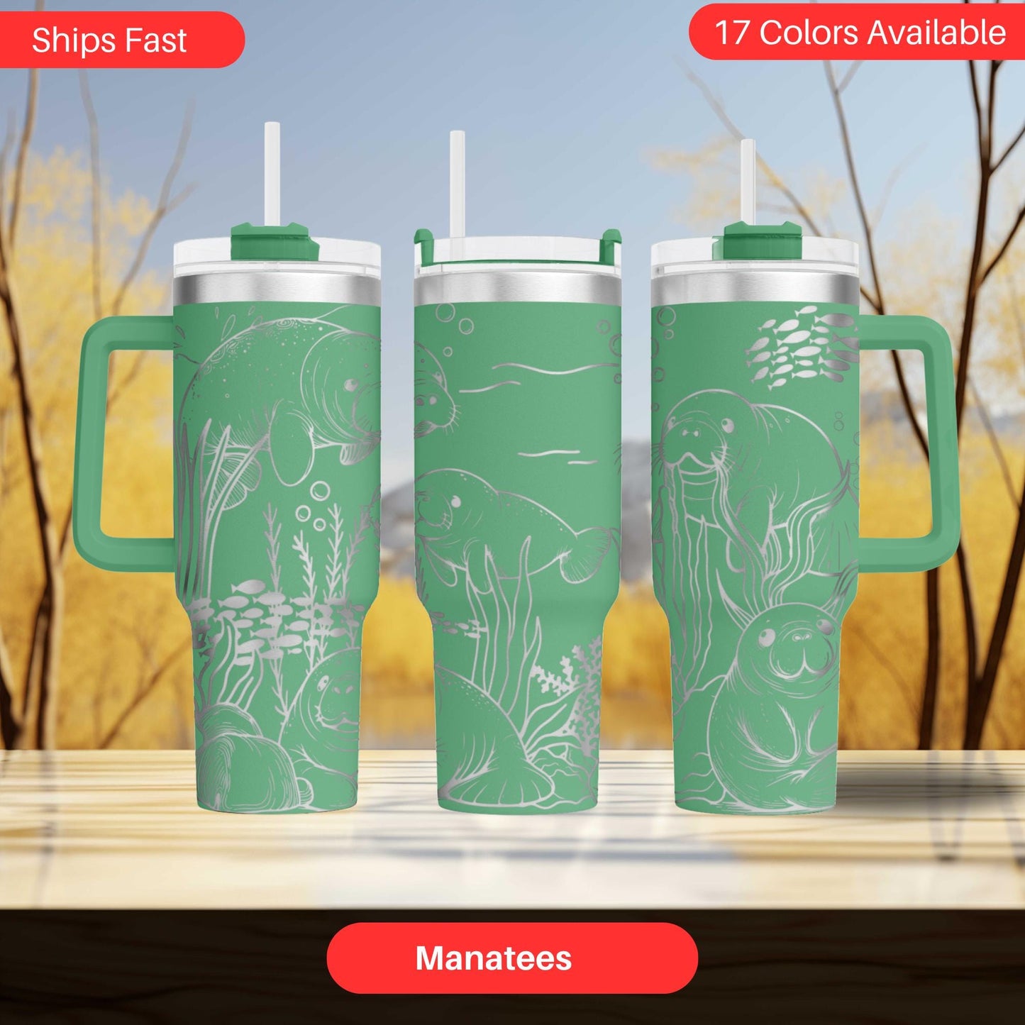 A set of three green tumblers with illustrations of manatees on them, displayed against a blurred background of trees.
