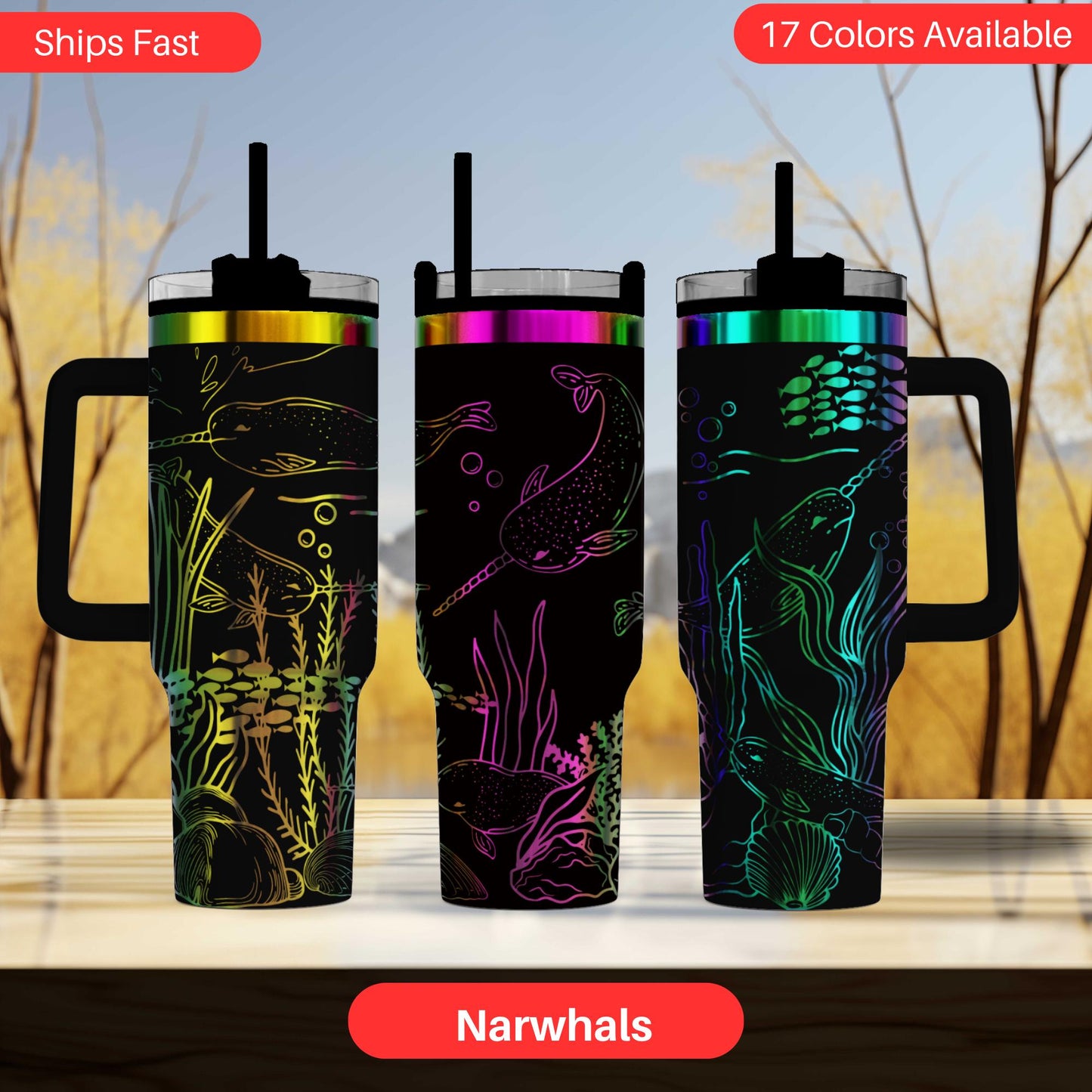 three colorful tumblers with fish designs, including narwhals, on their lids.