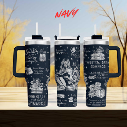 three black and white tumblers with various text and illustrations printed on them.