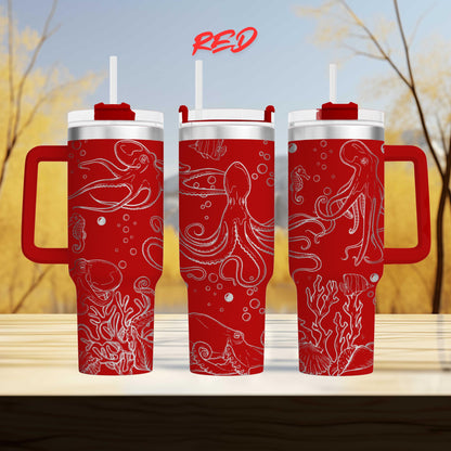 three red tumblers with white designs of marine life, including octopuses and bubbles, printed on them.
