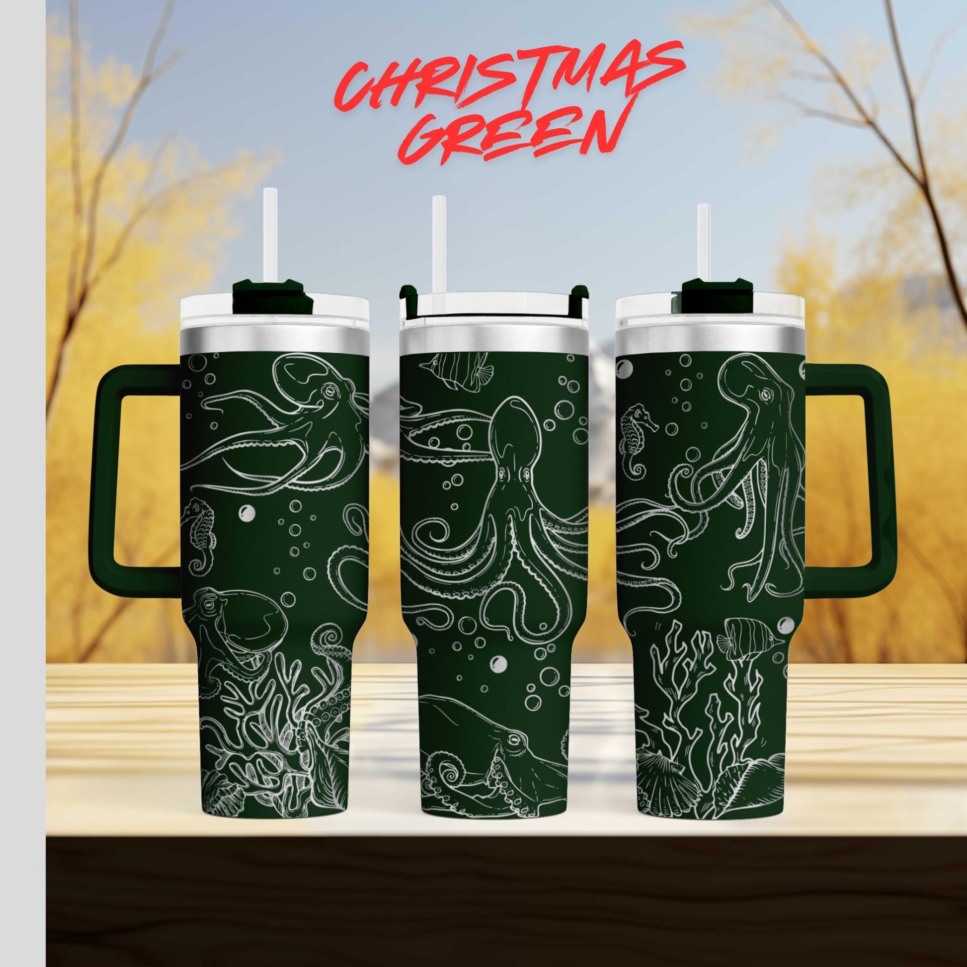 three green tumblers with white designs of octopuses and bubbles on them, set against a blurred background of trees and a blue sky.