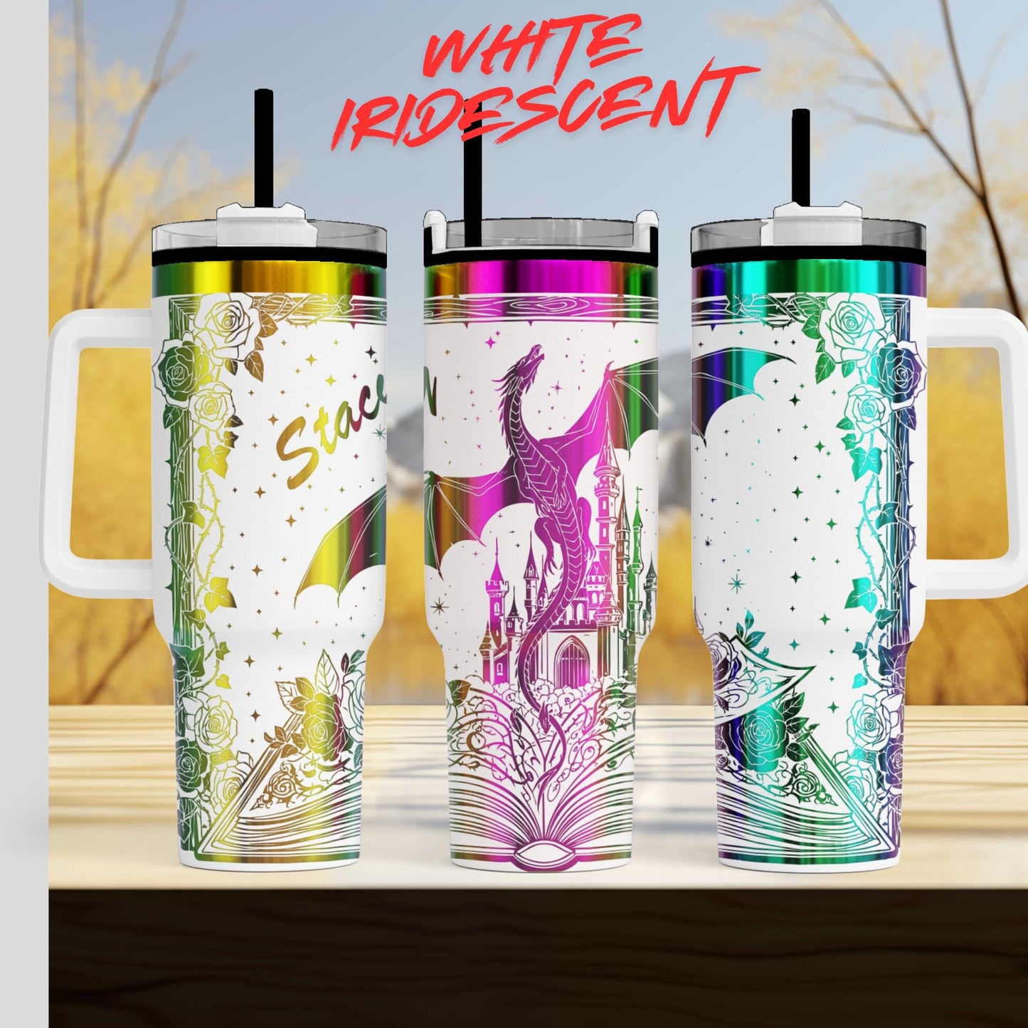 Three colorful, iridescent tumblers with various designs and patterns, including a dragon and castle motif.