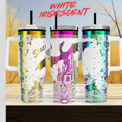 Three colorful, iridescent tumblers with various designs and patterns, including a dragon and castle motif.