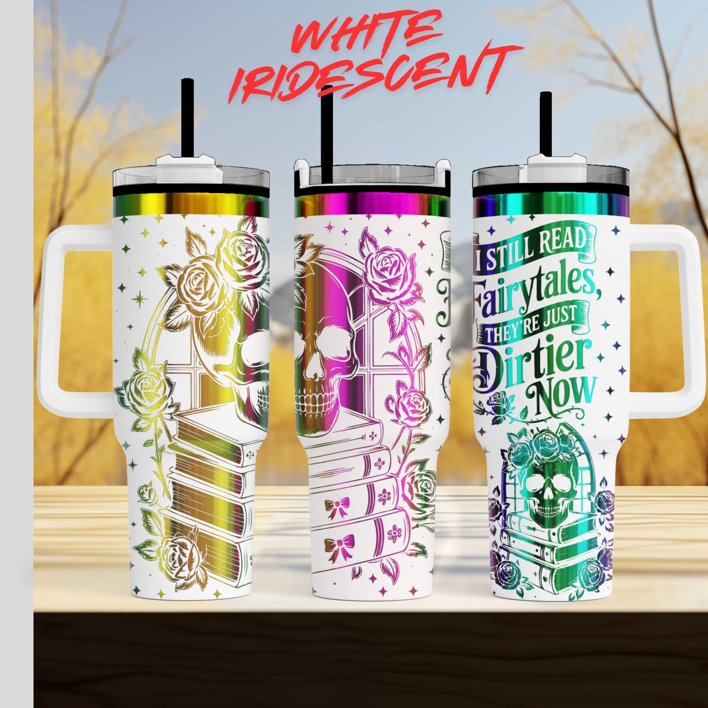 three colorful tumblers with various designs and text on them.