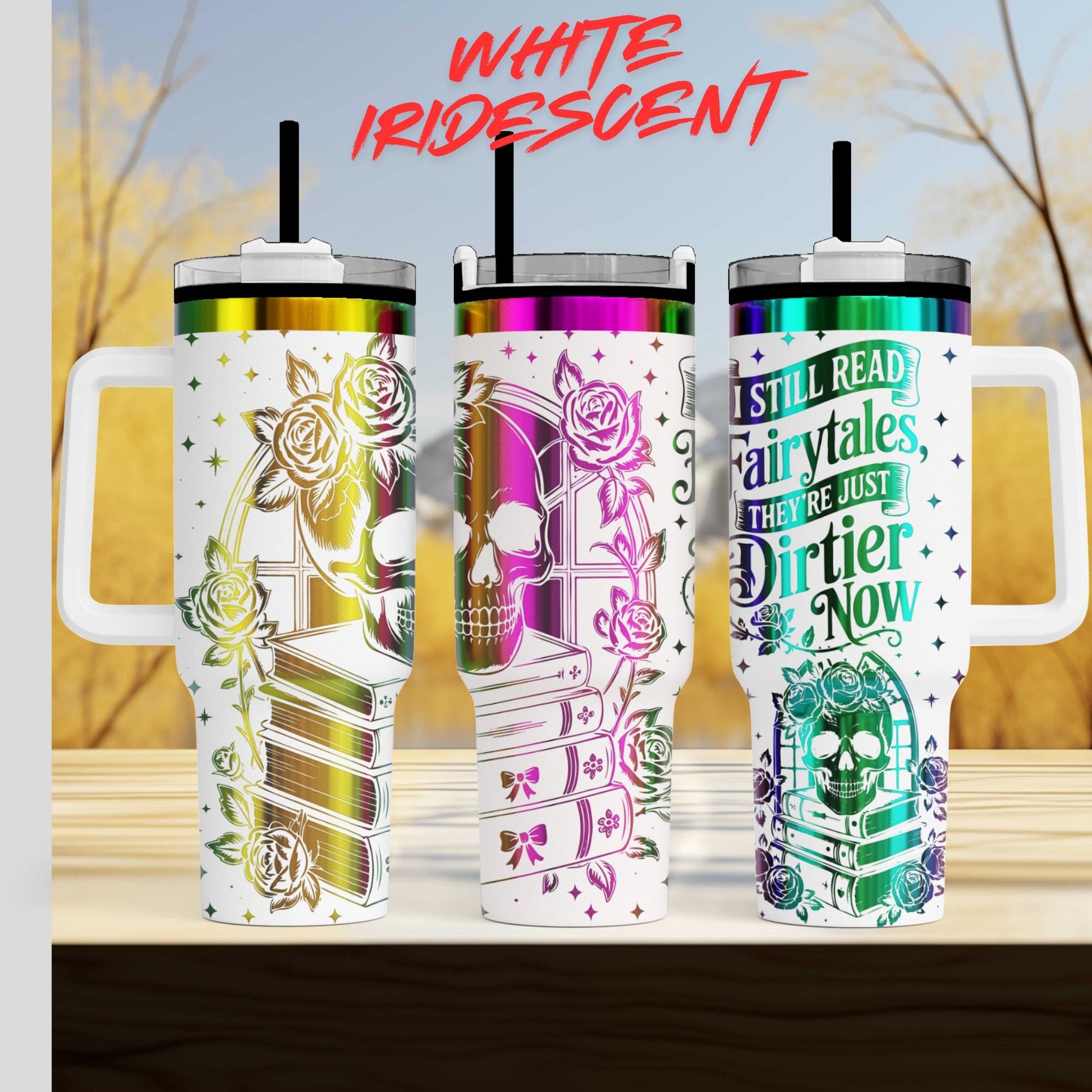 three colorful tumblers with various designs and text on them.