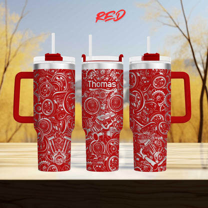 three red and silver thermos tumblers with a pattern of gears and machinery printed on them.