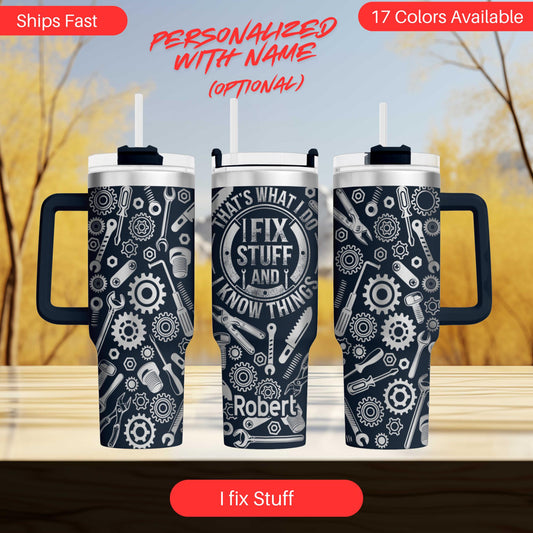 three black and white tumblers with a unique design that includes various tools and gears. The text on the tumblers reads "What's what I fix stuff and I know things" and "Robert". The tumblers are displayed on a wooden surface, and there is a blurred background that appears to be a tree.
